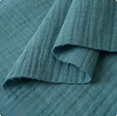 135GSM Tecido de borracha dupla de algodão 100% com mais de 200 cores prontas para vestuário de bebés e crianças